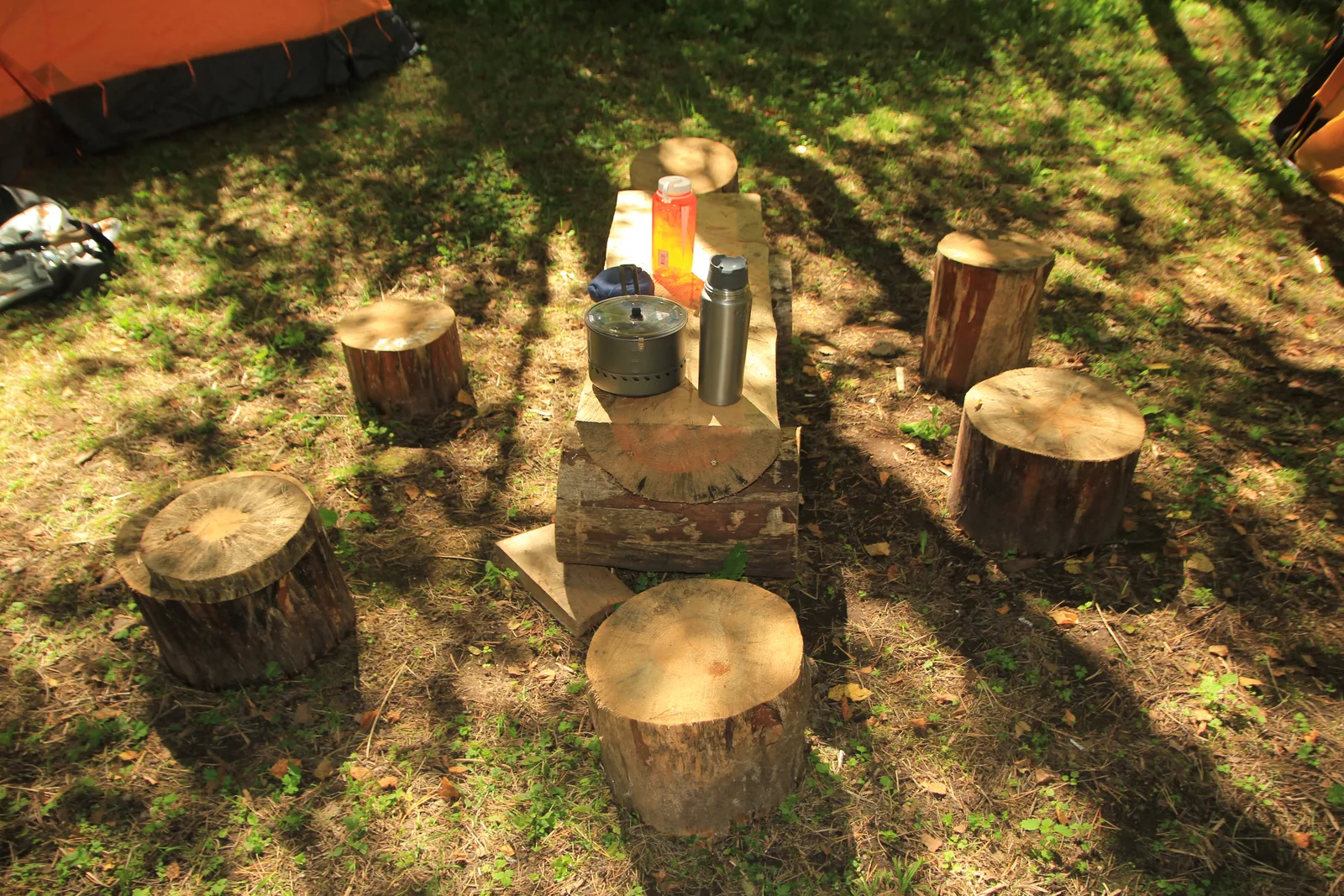 Shared outdoor seating at the campsite